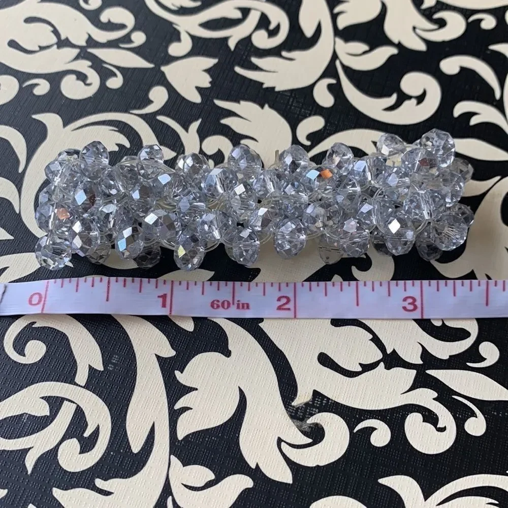 Clear, silver and iridescent beaded bracelet